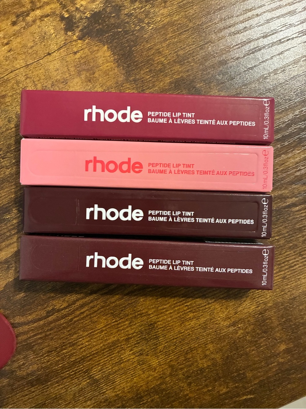 4 RHODE Peptide Lip Tints: Jelly Bean, PB&J, Espresso, and Raspberry Jelly